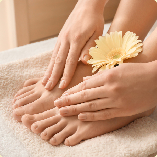 Relaxing foot care with a flower in a spa setting
