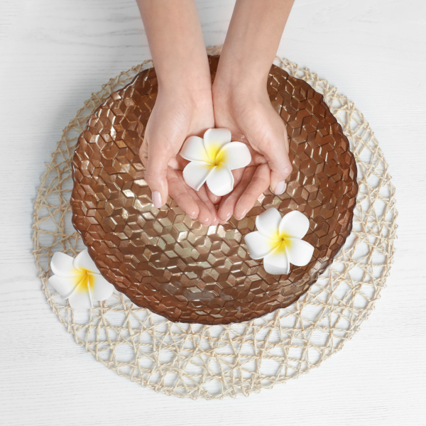 Well-groomed hands in a spa setting